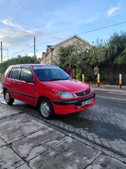 Toyota Raum 2000 Red for sale