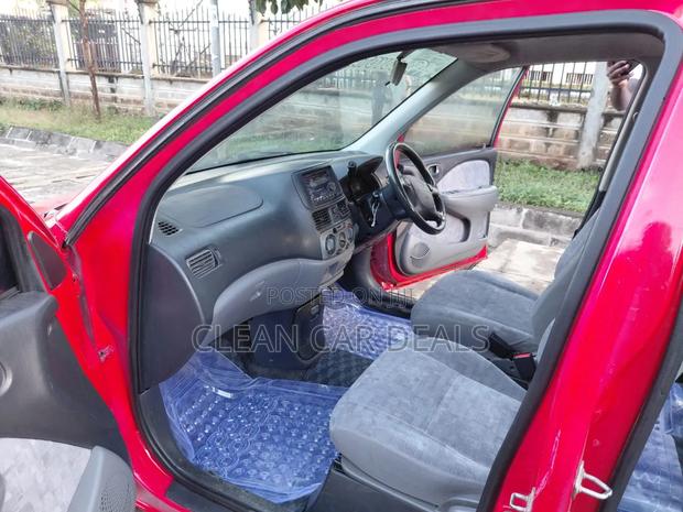 Toyota Raum 2000 Red