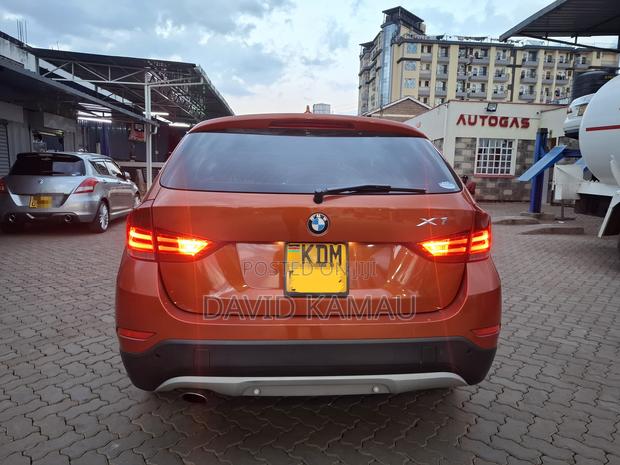 BMW X1 sDrive28i 4dr SUV (2.0L 4cyl Turbo 8A) 2015 Orange