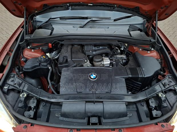 BMW X1 sDrive28i 4dr SUV (2.0L 4cyl Turbo 8A) 2015 Orange