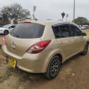 Nissan Tiida 2010 Yellow for sale