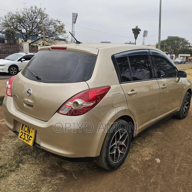 Nissan Tiida 2010 Yellow
