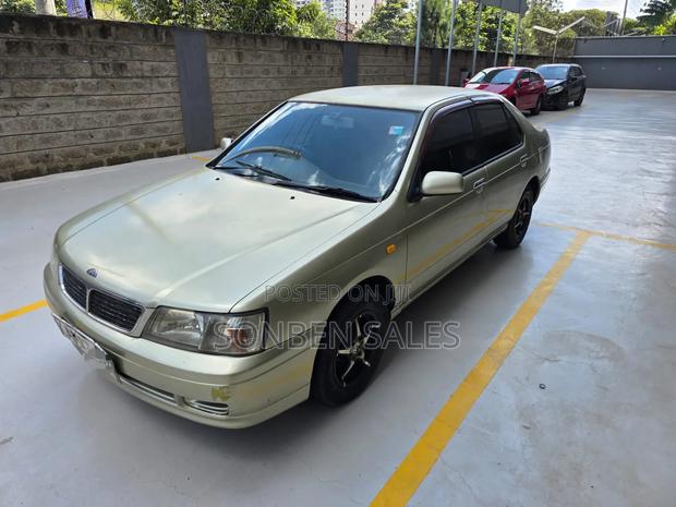 Nissan FB14 1998 Gold