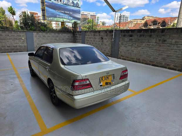 Nissan FB14 1998 Gold