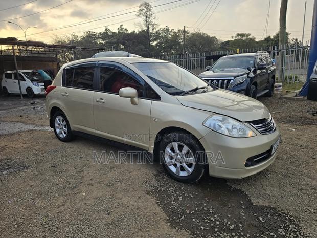 Nissan Tiida 2010 Gold