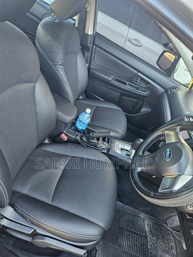 Subaru Impreza 2.0i Limited PZEV 4dr Sedan AWD (2.0L 4cyl CVT) 2014