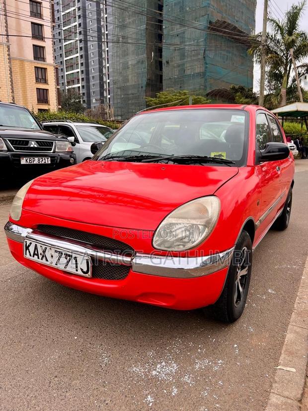 Toyota Duet 1999 Red