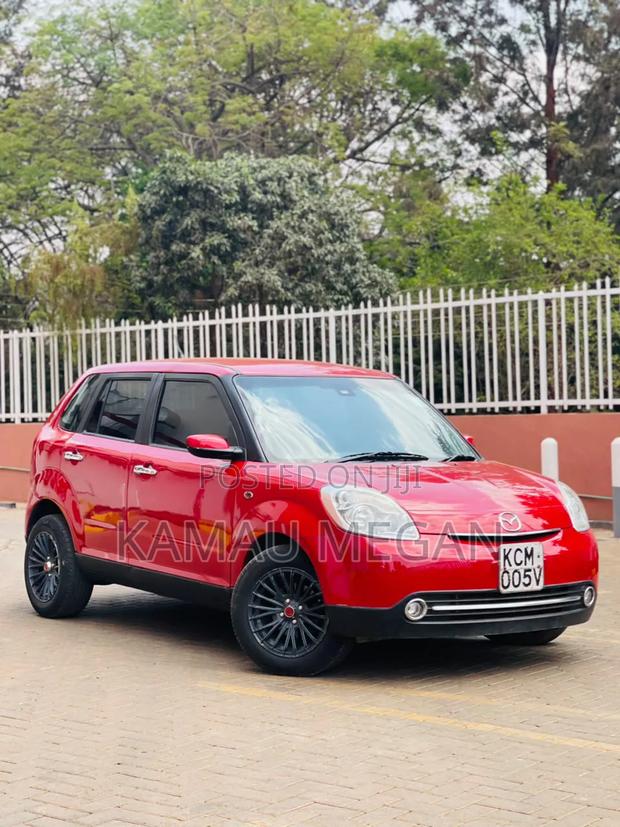Mazda Verisa 2010 Red
