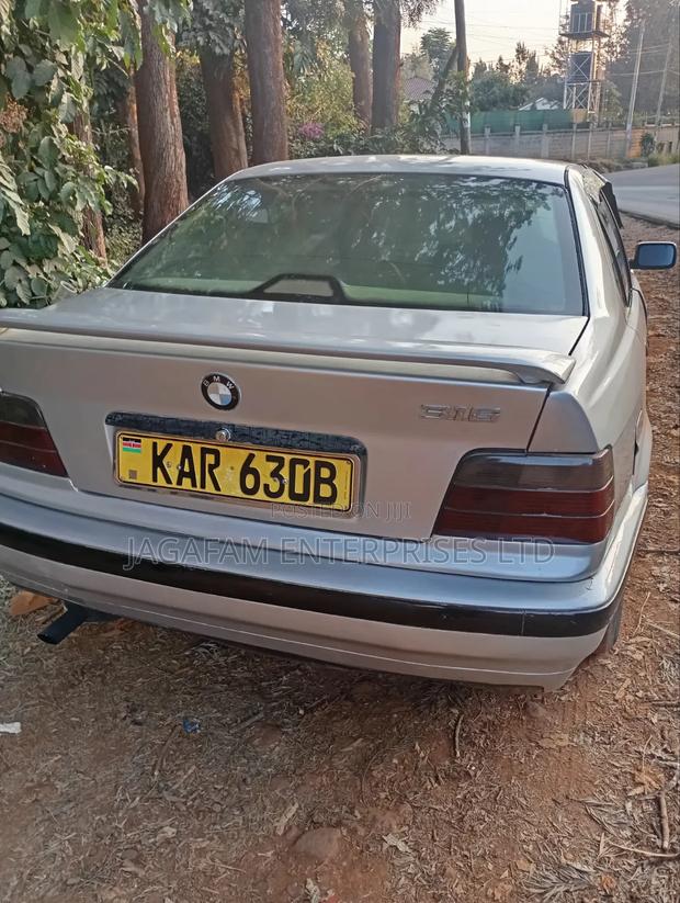 BMW 320i Sedan RWD 1999 Silver