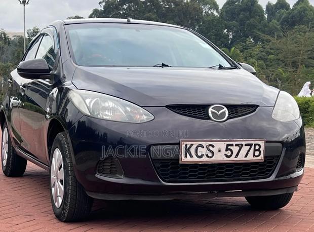 Mazda Demio 2012 Maroon