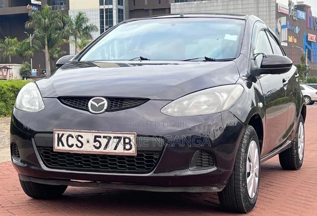 Mazda Demio 2012 Maroon