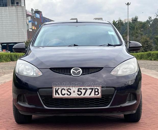 Mazda Demio 2012 Brown