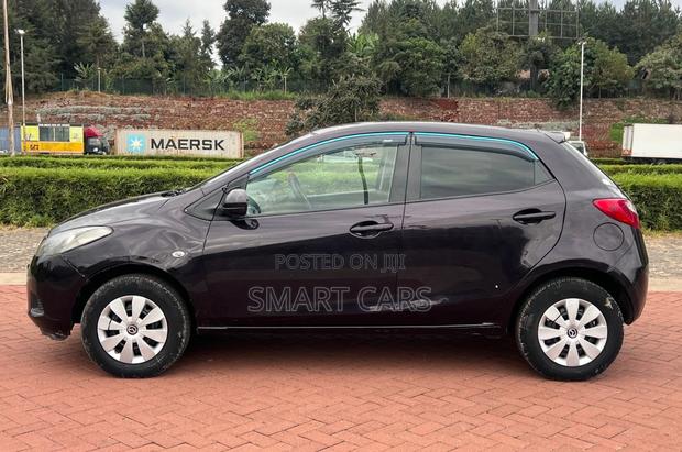 Mazda Demio 2012 Brown