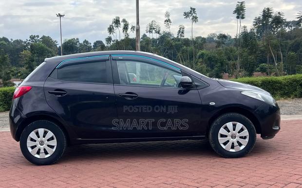 Mazda Demio 2012 Brown