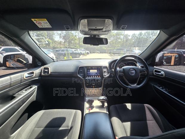 Jeep Grand Cherokee Laredo 4dr SUV 4WD (3.6L 6cyl 8A) 2015 White