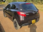 Mazda Demio 2011 Maroon for sale