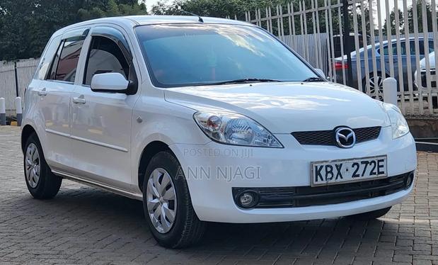 Mazda Demio 2006 Pearl