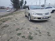 Nissan Tiida 1.5L 16V 2010 Beige for sale