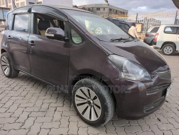 Toyota Ractis 2009 Maroon