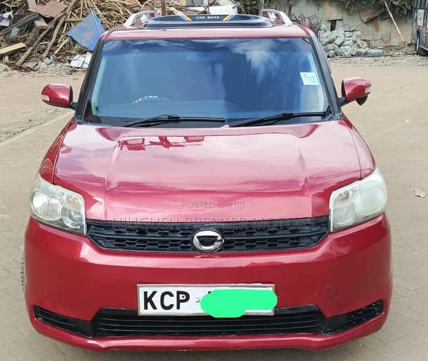 Toyota Corolla Rumion 2011 Maroon