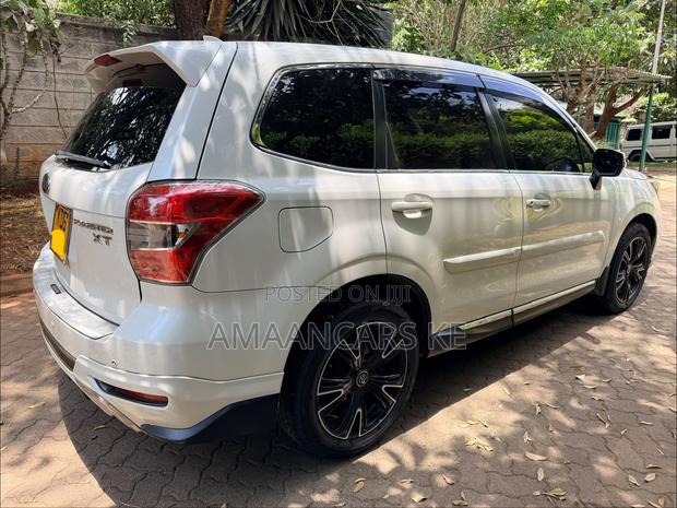 Subaru Forester 2.0XT Touring 4dr SUV AWD (2.0L 4cyl Turbo CVT) 2014