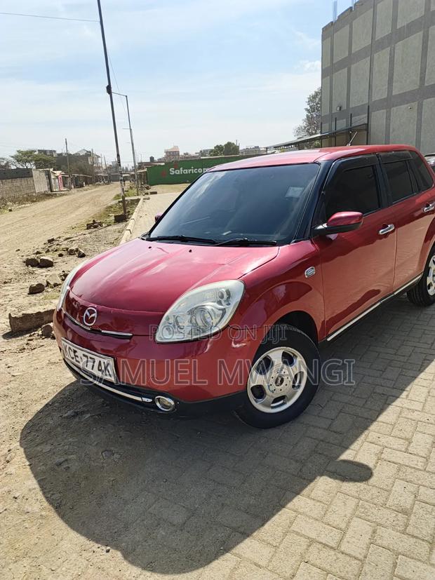 Mazda Verisa 2009 Maroon