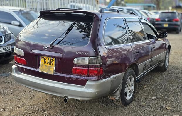 Toyota Corolla 2002 Maroon