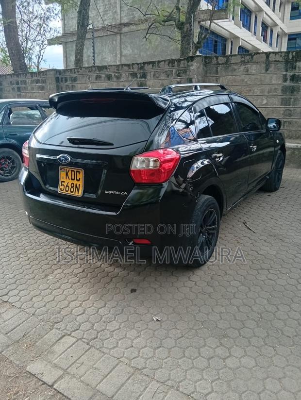 Subaru Impreza 2.0i Limited PZEV 4dr Hatchback AWD (2.0L 4cyl CVT) 2014