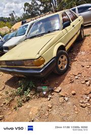 Nissan Sunny B12 Sedan 1.3 1990 Yellow for sale