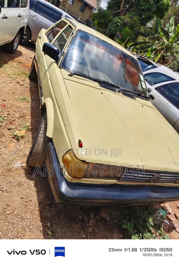 Nissan Sunny B12 Sedan 1.3 1990 Yellow