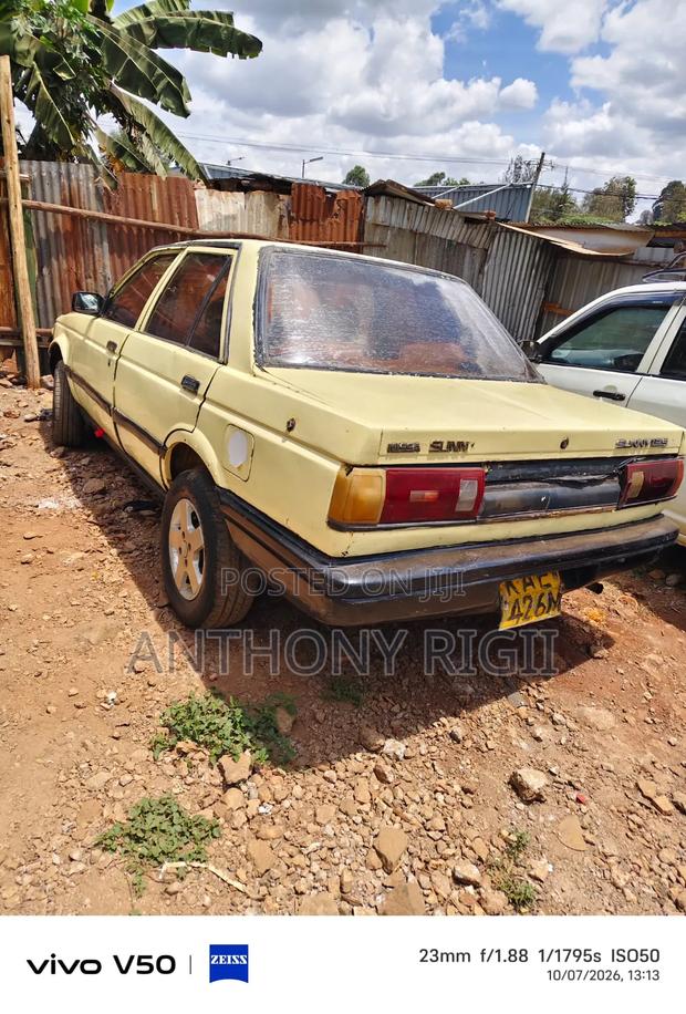 Nissan Sunny B12 Sedan 1.3 1990 Yellow