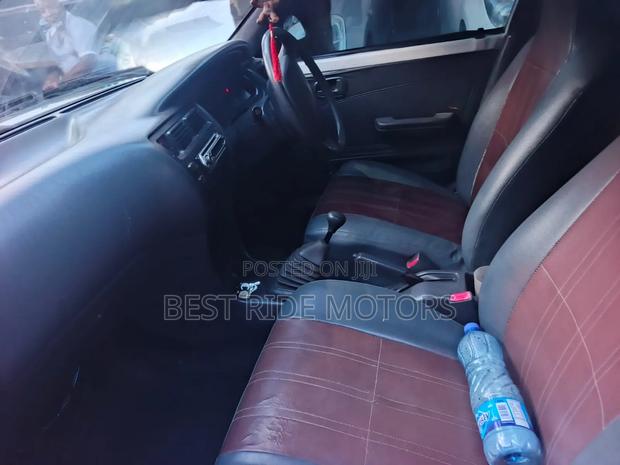 Toyota Corolla Hatchback 1999 White