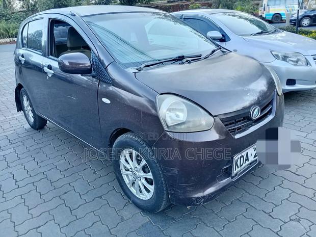 Daihatsu Mira 2013 Maroon