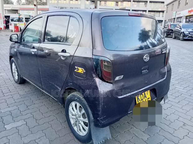 Daihatsu Mira 2013 Maroon