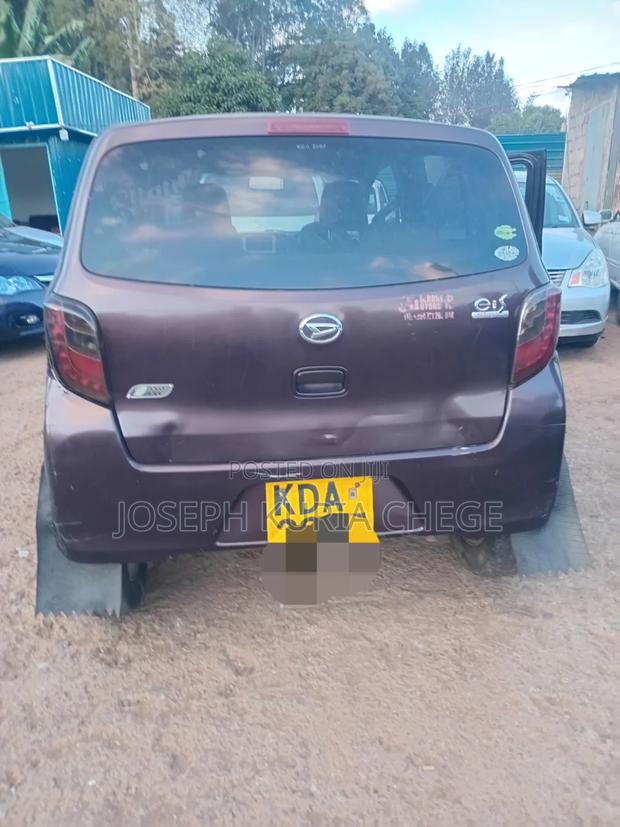 Daihatsu Mira 2013 Maroon