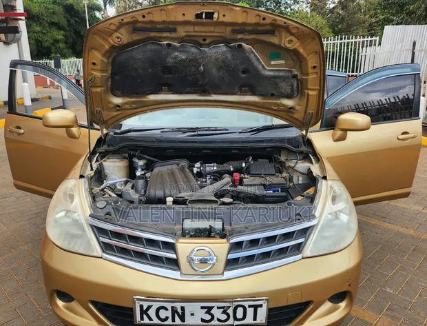 Nissan Tiida 2010 Gold