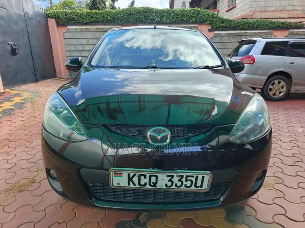 Mazda Demio 2011 Burgundy