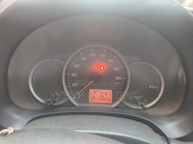 Toyota Vitz 2013 Burgundy