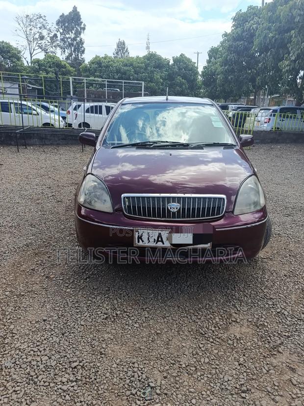 Toyota Vitz 2002 Maroon