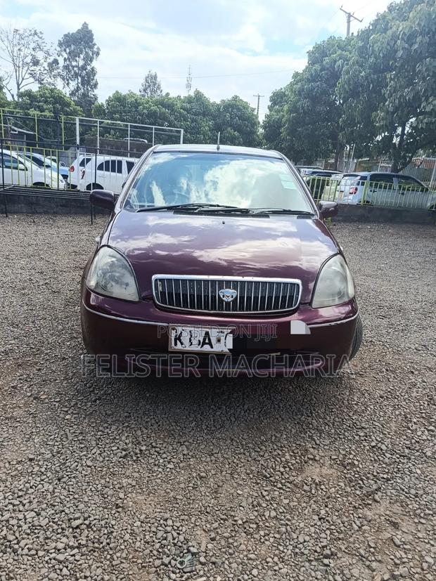 Toyota Vitz 2002 Maroon