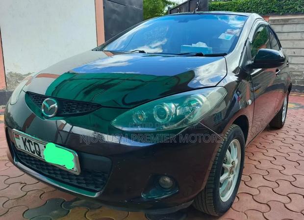 Mazda Demio 2011 Brown