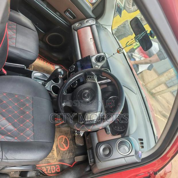 Mazda Verisa 2010 Red