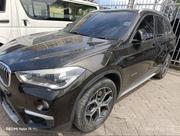 BMW X1 xDrive28i AWD 2016 Brown for sale