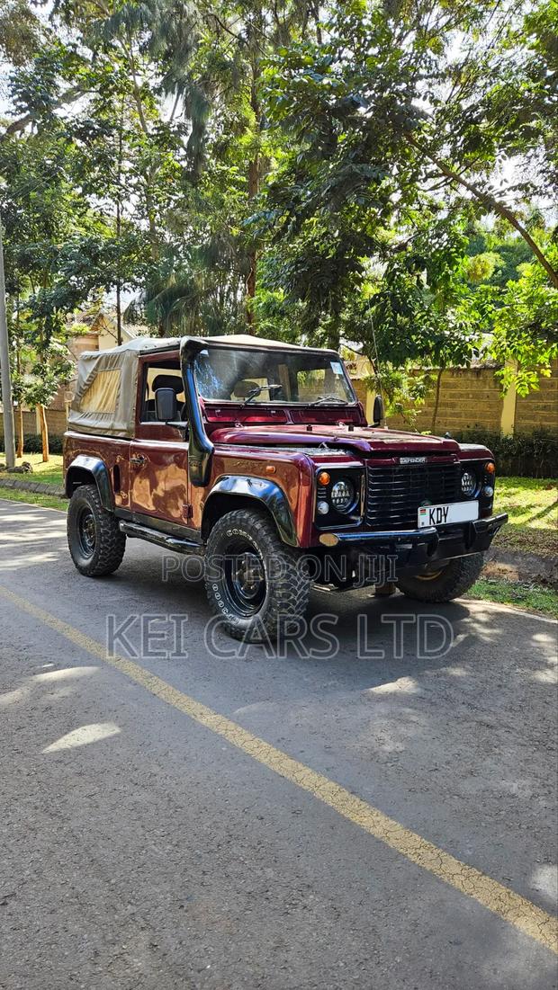 Land Rover Defender 2002 Maroon