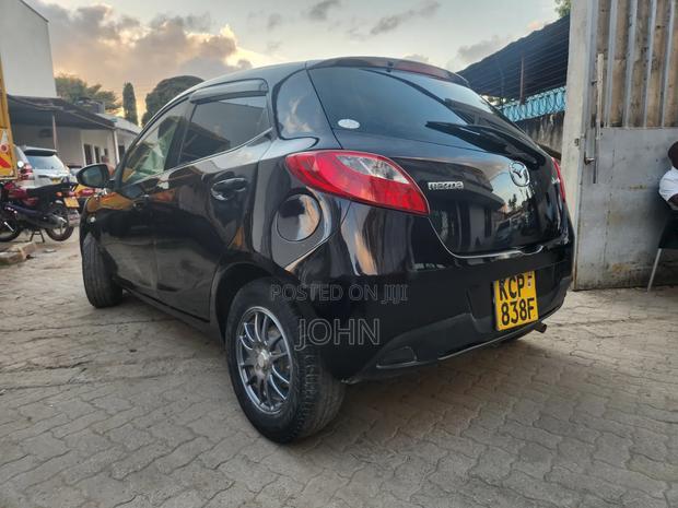 Mazda Demio 2009 Maroon