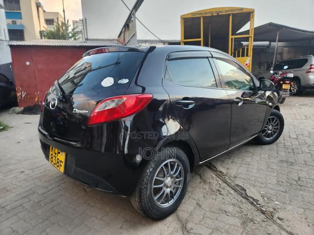 Mazda Demio 2009 Maroon