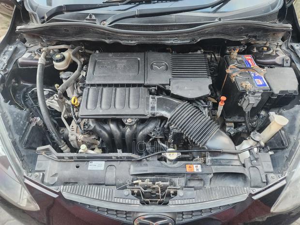 Mazda Demio 2009 Maroon