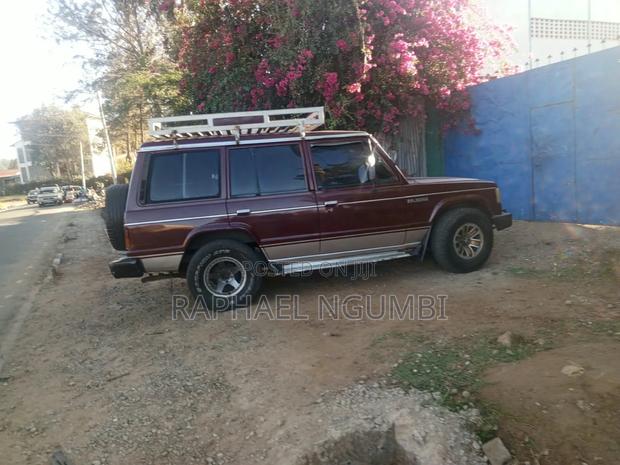 Mitsubishi Pajero Junior 1997 Maroon