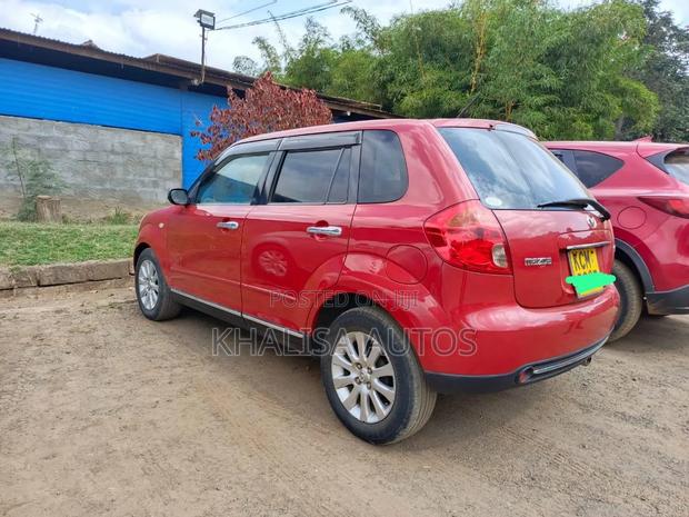 Mazda Verisa 2010 Red