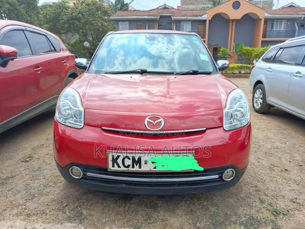 Mazda Verisa 2010 Red